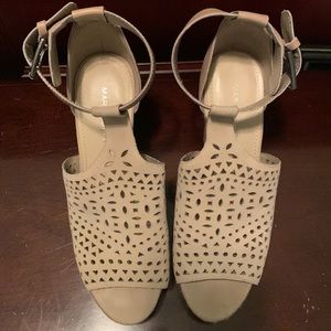 Marc Fisher all leather cutout laser detail light tan wedge. Worn once!